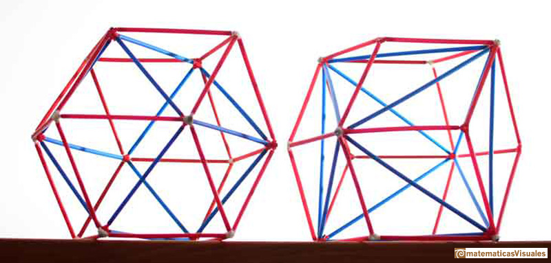  rhombic dodecahedra with an inscribed cube (at left) and an inscribed octahedron (at right);