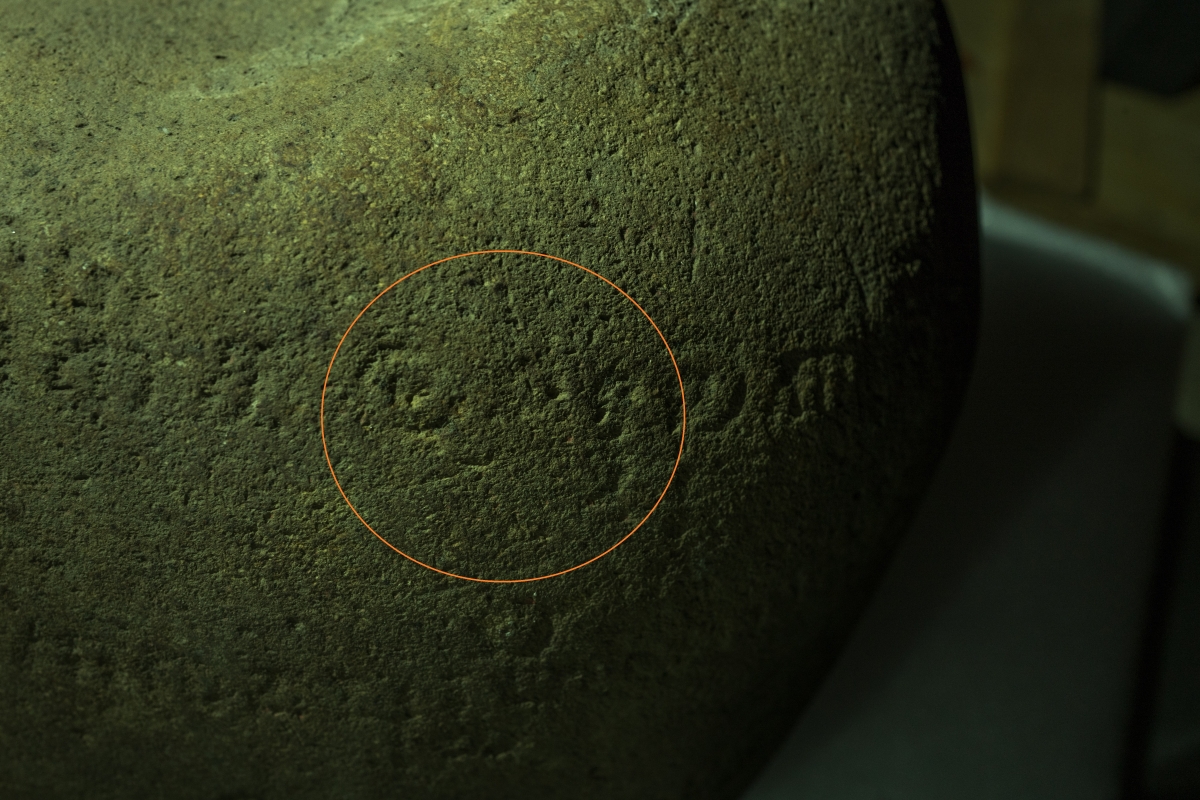 The earliest of the three stones, known as the Kedukan Bukit inscription, showing an Old Malay zero symbol.